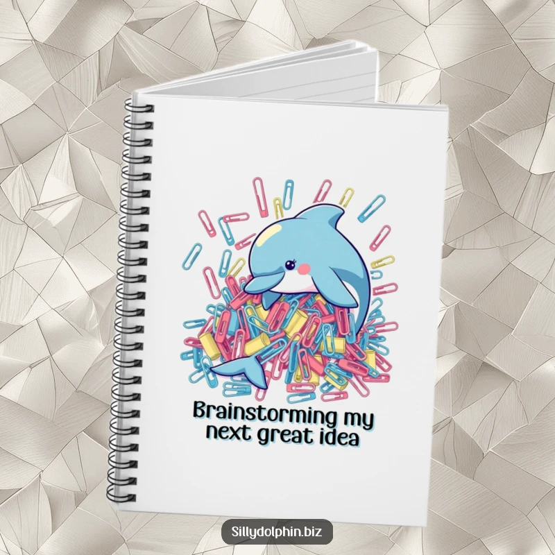 Funny notebook cover illustration of a playful dolphin trying to organize a huge pile of oversized paperclips, ready for your thoughts.